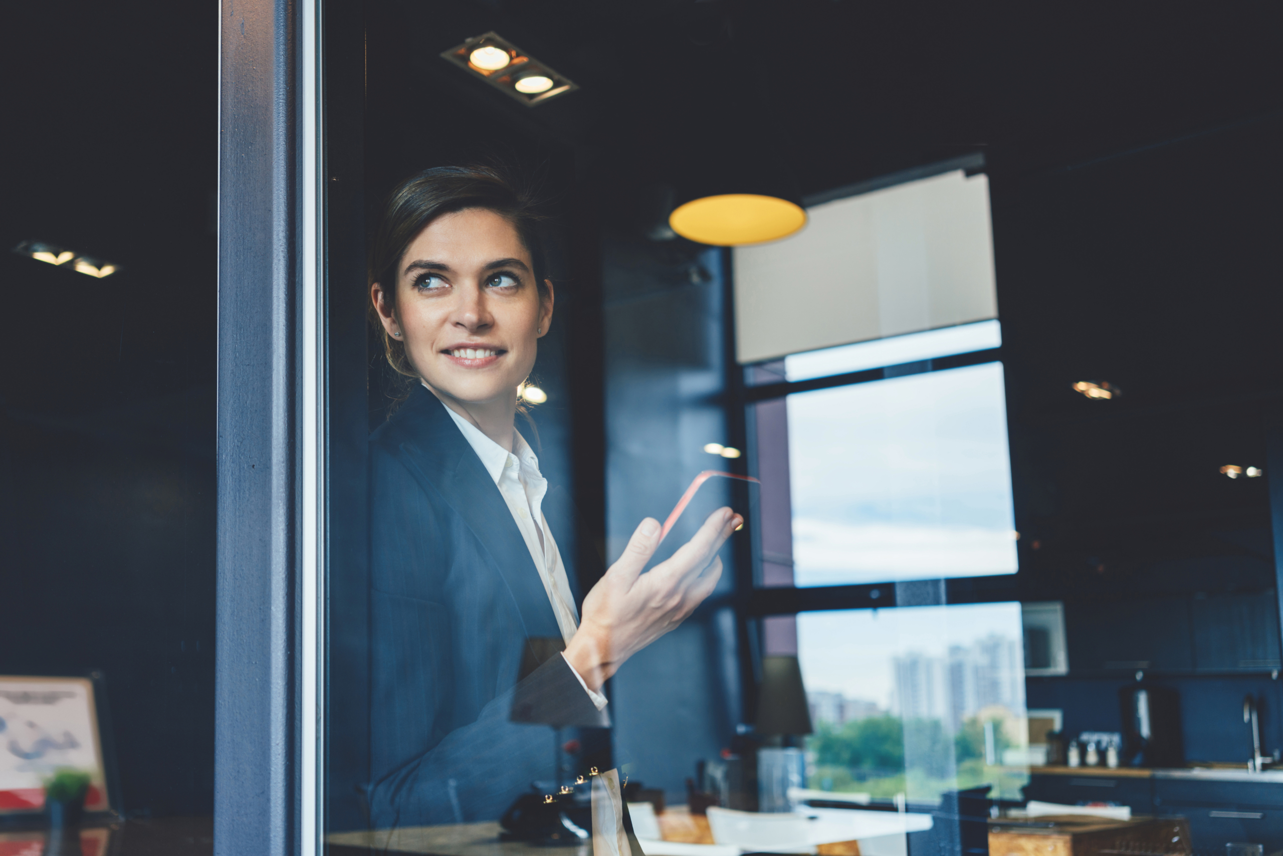 Business concept, smart casual dressed woman with mobile phone s